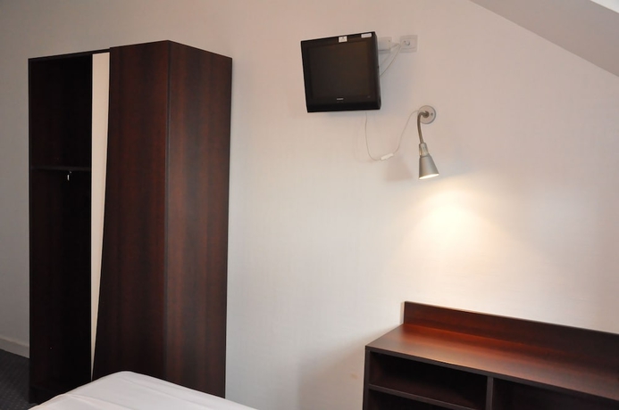 Imagen de la habitación del Hotel Le Lorient. Foto 13