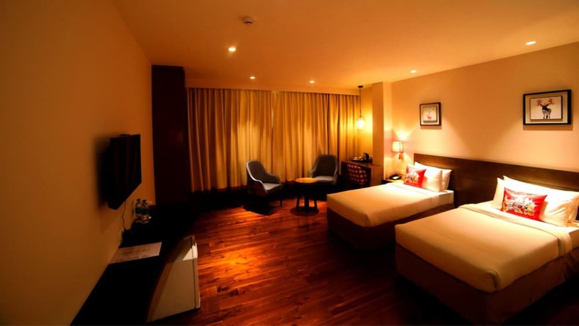 Imagen de la habitación del Hotel Le Lotus Grand Varanasi. Foto 11