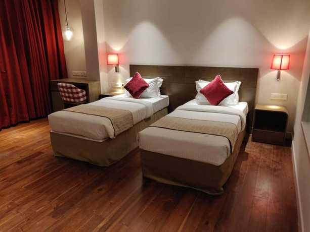 Imagen de la habitación del Hotel Le Lotus Grand Varanasi. Foto 14