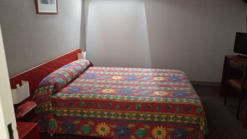 Imagen de la habitación del Hotel Le Lumière. Foto 2