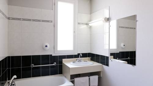 Imagen de la habitación del Hotel Le Lumière. Foto 3