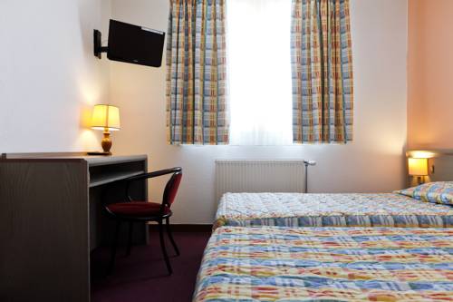 Imagen de la habitación del Hotel Le Lumière. Foto 5