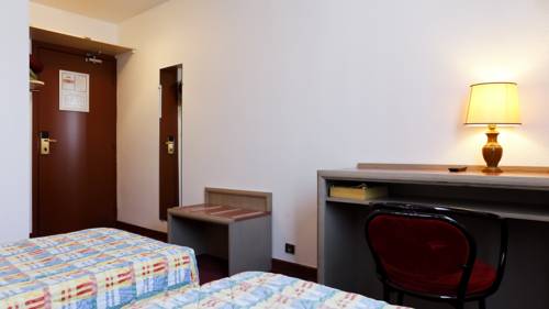 Imagen de la habitación del Hotel Le Lumière. Foto 9