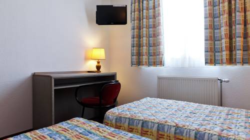 Imagen de la habitación del Hotel Le Lumière. Foto 10