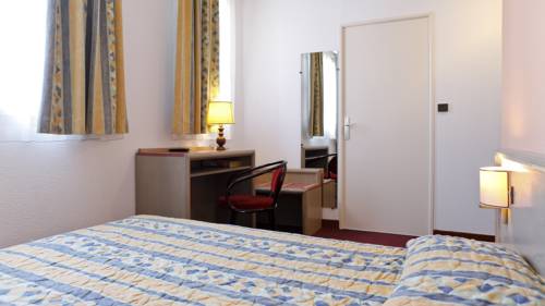 Imagen de la habitación del Hotel Le Lumière. Foto 13