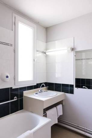 Imagen de la habitación del Hotel Le Lumière. Foto 15