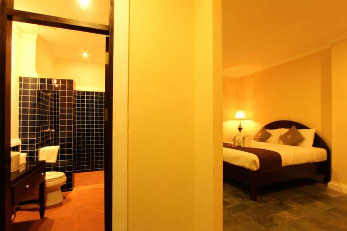 Imagen de la habitación del Hotel Le Luxe Boutique. Foto 23