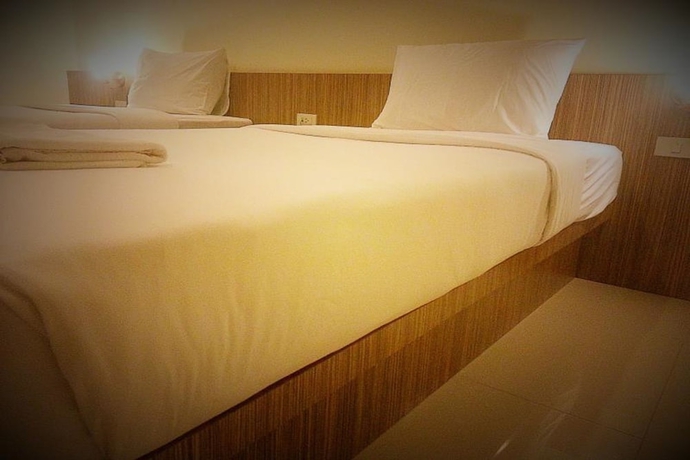 Imagen de la habitación del Hotel Le Luxe Residence. Foto 5