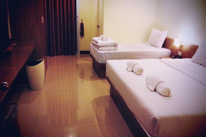 Imagen de la habitación del Hotel Le Luxe Residence. Foto 8
