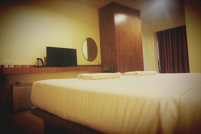 Imagen de la habitación del Hotel Le Luxe Residence. Foto 9