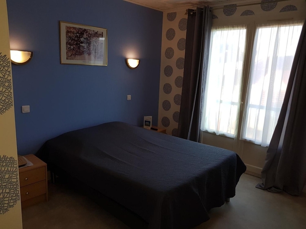 Imagen de la habitación del Hotel Le Lyon Vert. Foto 11