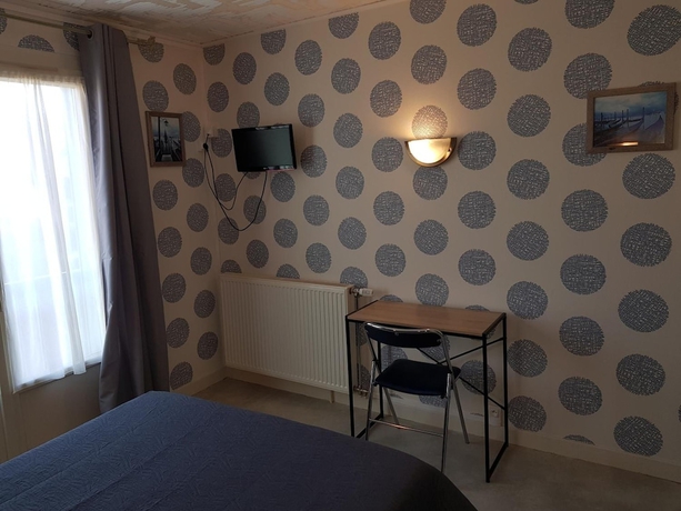 Imagen de la habitación del Hotel Le Lyon Vert. Foto 13