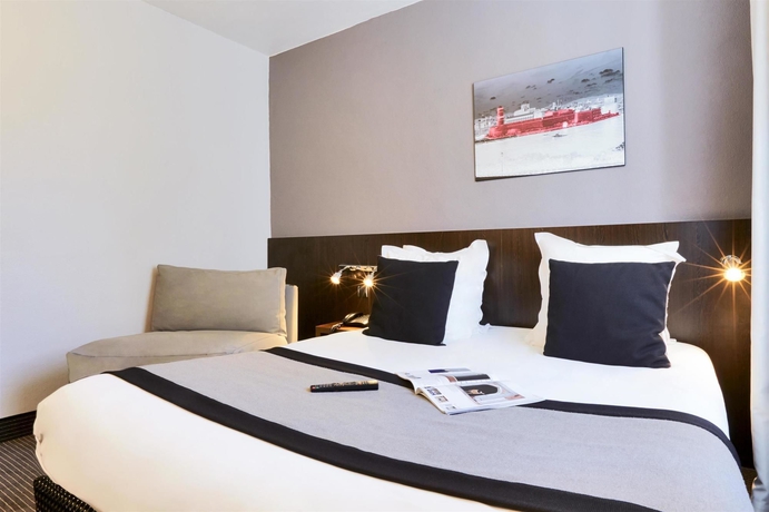 Imagen de la habitación del Hotel Le M Hôtel. Foto 11