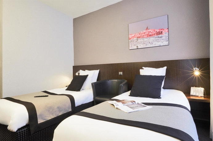 Imagen de la habitación del Hotel Le M Hôtel. Foto 15