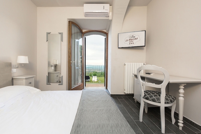 Imagen de la habitación del Hotel Le Macine. Foto 4