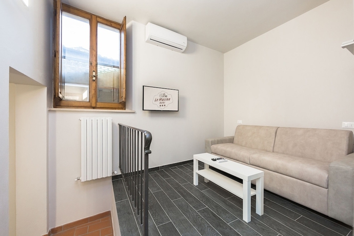 Imagen de la habitación del Hotel Le Macine. Foto 12