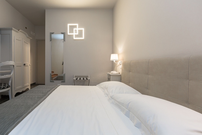 Imagen de la habitación del Hotel Le Macine. Foto 14