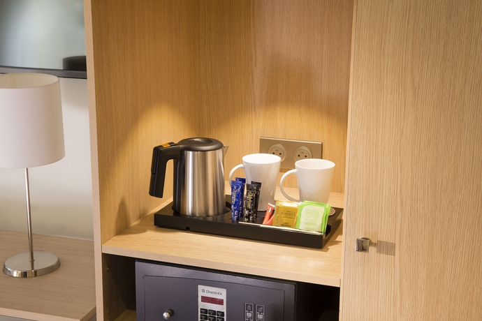 Imagen de la habitación del Hotel Le Magnifique. Foto 9