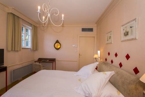 Imagen de la habitación del Hotel Le Manoir Au Lac. Foto 12