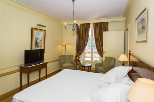 Imagen de la habitación del Hotel Le Manoir Au Lac. Foto 16