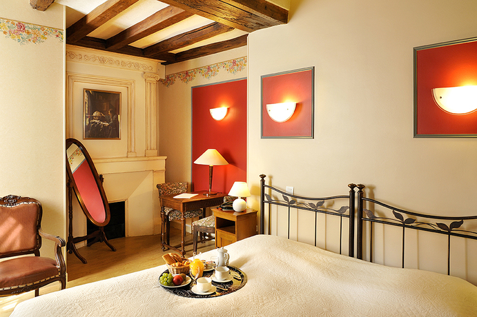 Imagen de la habitación del Hotel Le Manoir De La Giraudière. Foto 6