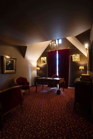 Imagen de la habitación del Hotel Le Manoir Des Ducs. Foto 3