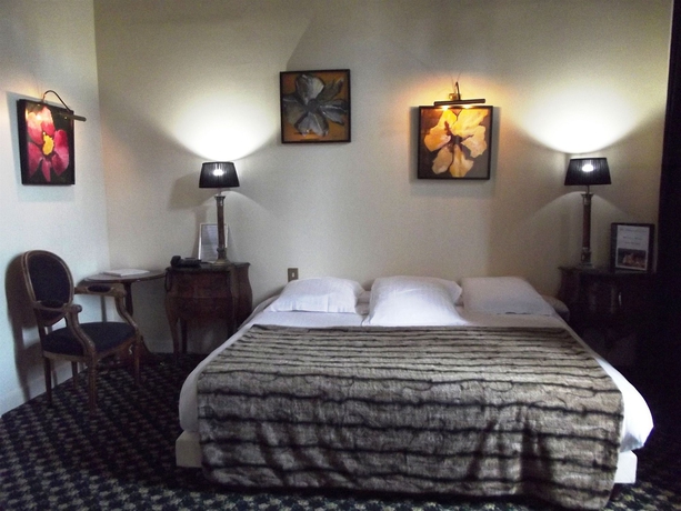 Imagen de la habitación del Hotel Le Manoir Des Ducs. Foto 4