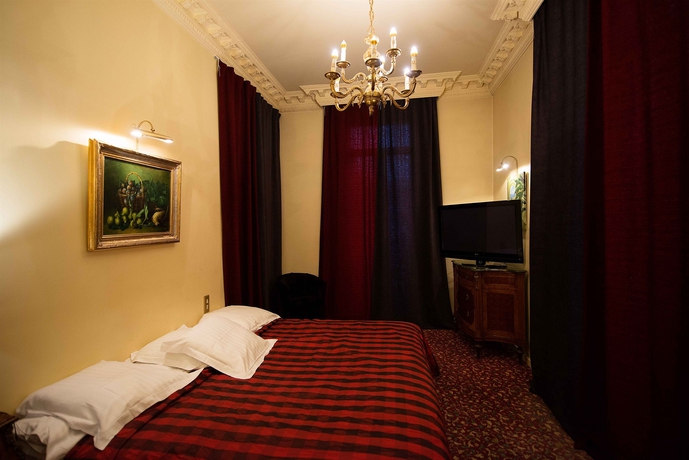 Imagen de la habitación del Hotel Le Manoir Des Ducs. Foto 6