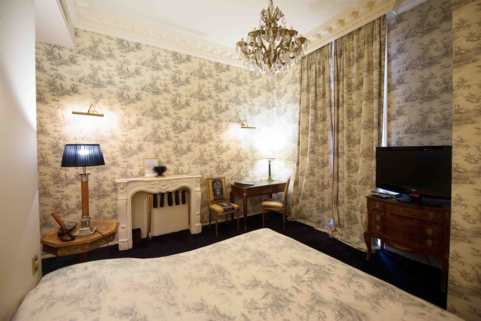 Imagen de la habitación del Hotel Le Manoir Des Ducs. Foto 7