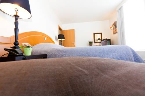 Imagen de la habitación del Hotel Le Manoir Du Capitaine. Foto 9