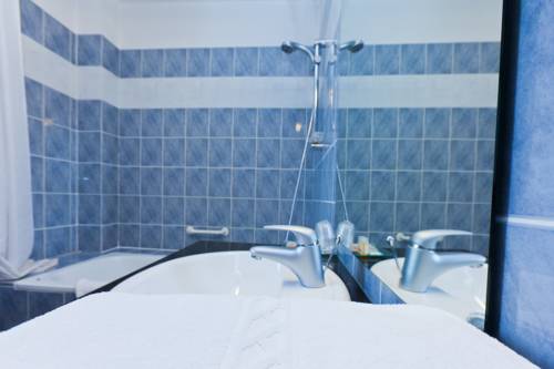 Imagen de la habitación del Hotel Le Manoir Du Capitaine. Foto 14