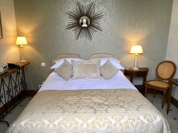 Imagen de la habitación del Hotel Le Manoir Les Minimes. Foto 4