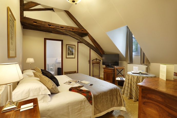 Imagen de la habitación del Hotel Le Manoir Les Minimes. Foto 5