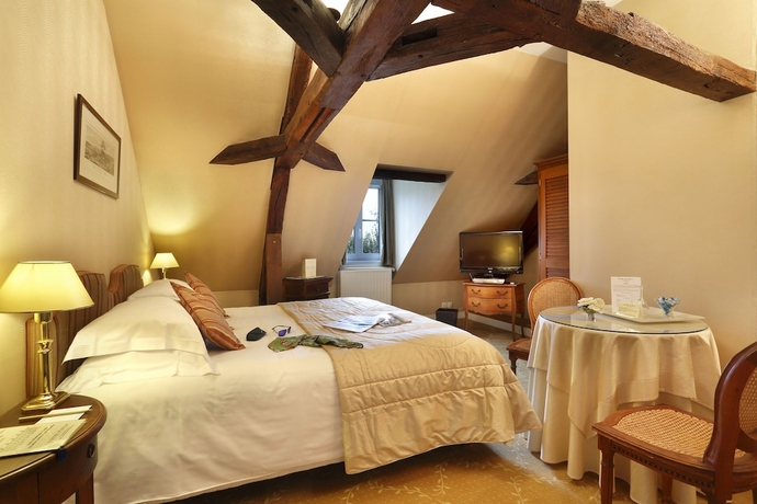 Imagen de la habitación del Hotel Le Manoir Les Minimes. Foto 6