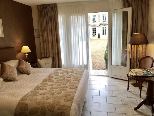 Imagen de la habitación del Hotel Le Manoir Les Minimes. Foto 7