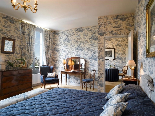 Imagen de la habitación del Hotel Le Manoir Les Minimes. Foto 9