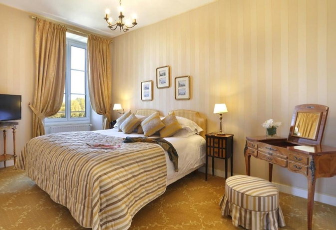 Imagen de la habitación del Hotel Le Manoir Les Minimes. Foto 10