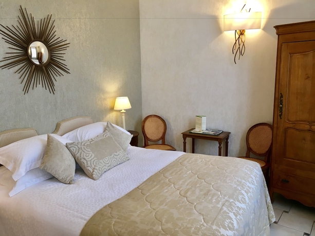 Imagen de la habitación del Hotel Le Manoir Les Minimes. Foto 15