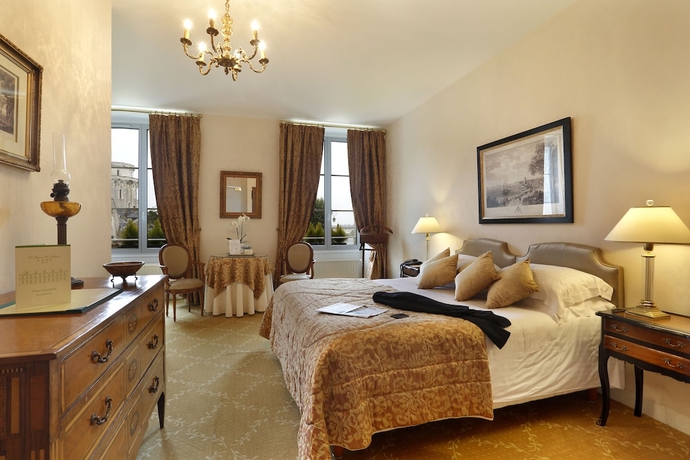 Imagen de la habitación del Hotel Le Manoir Les Minimes. Foto 18