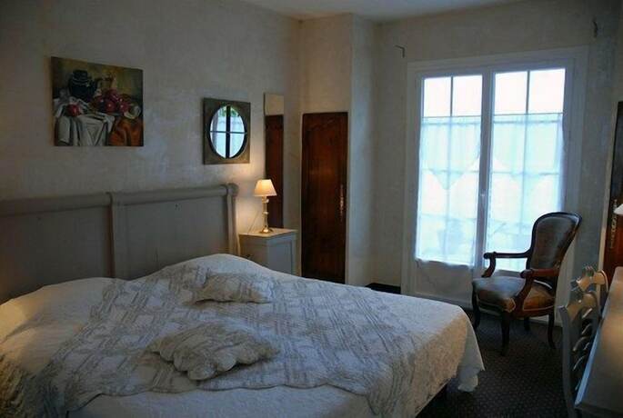Imagen de la habitación del Hotel Le Manoir de l\'Antiquite. Foto 13