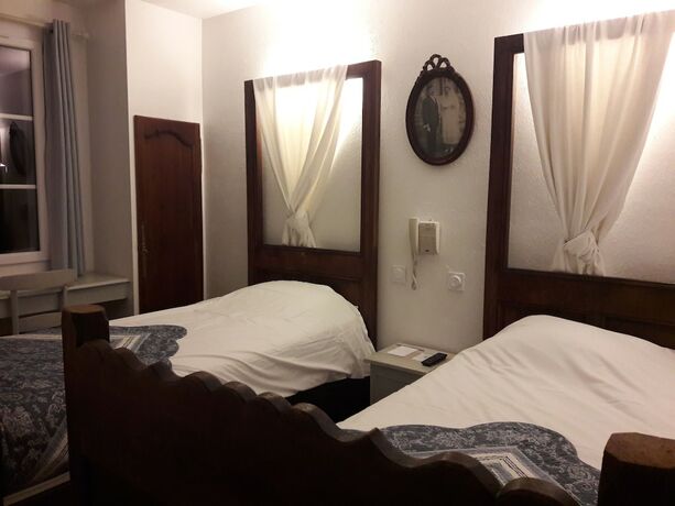 Imagen de la habitación del Hotel Le Manoir de l\'Antiquite. Foto 16