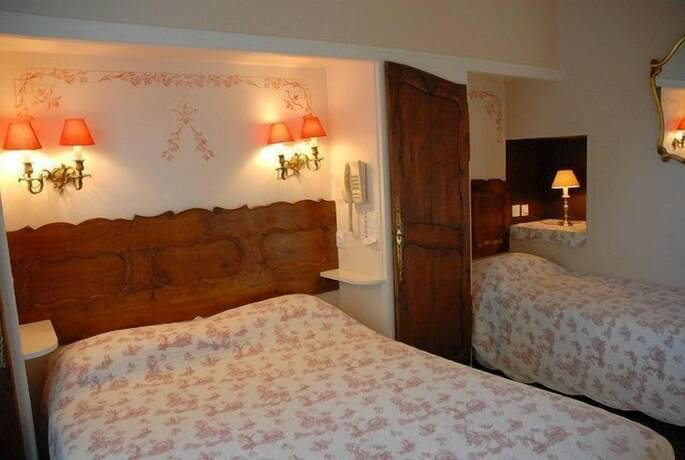 Imagen de la habitación del Hotel Le Manoir de l\'Antiquite. Foto 18