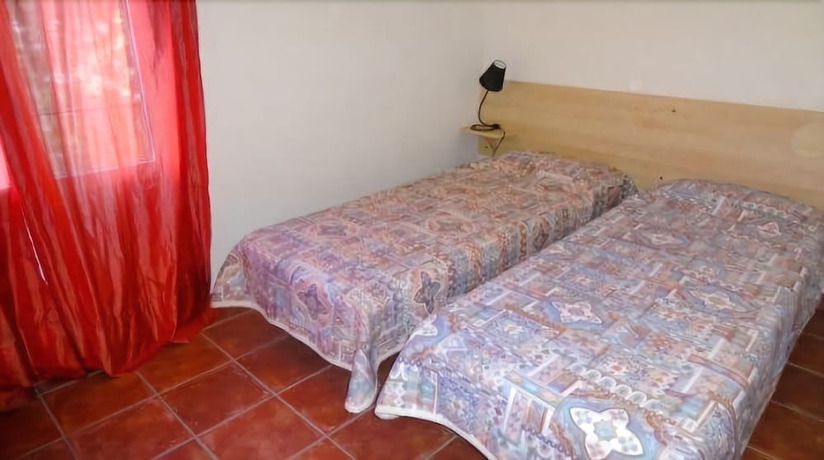 Imagen de la habitación del Hotel Le Maquis Plage. Foto 13