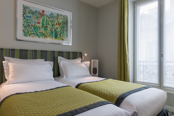 Imagen de la habitación del Hotel Le Mareuil. Foto 9