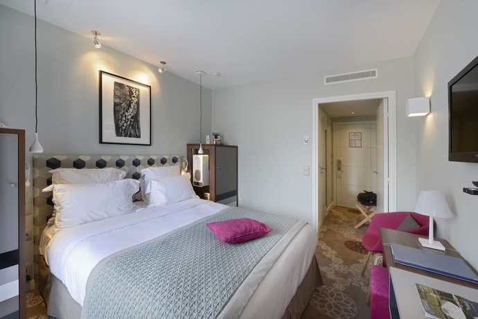 Imagen de la habitación del Hotel Le Mareuil. Foto 11