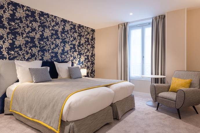 Imagen de la habitación del Hotel Le Mareuil. Foto 15