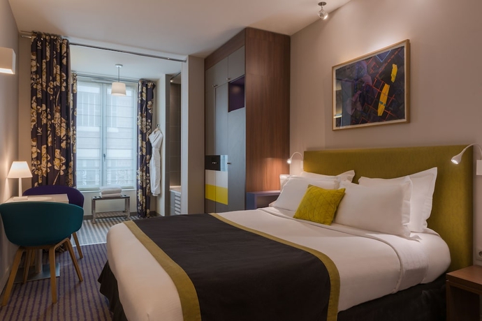 Imagen de la habitación del Hotel Le Mareuil. Foto 18