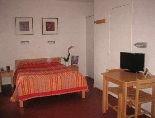 Imagen de la habitación del Hotel Le Marintan. Foto 12