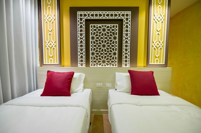 Imagen de la habitación del Hotel Le Maroc Hotel Patong. Foto 8