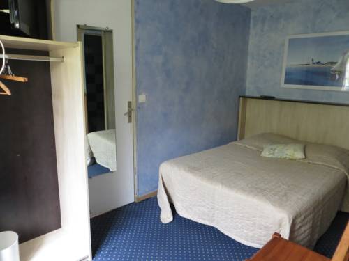 Imagen de la habitación del Hotel Le Mas De La Frigoulette. Foto 7